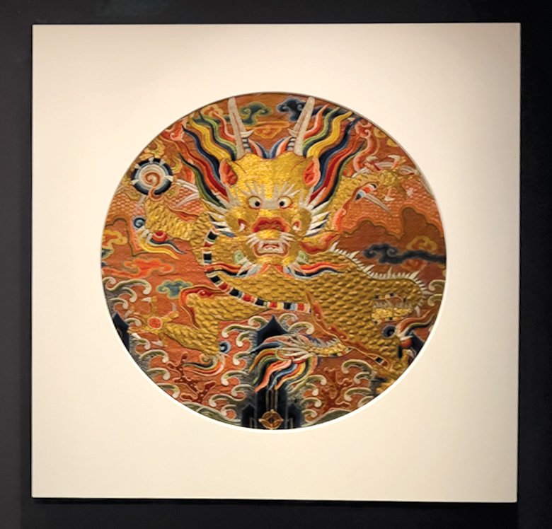 Roundel with winged dragon, Ming dynasty, Wanli period (1573-1620), Embroidery, polychrome and metallic-wrapped silk threads on silk gauze, Chris Hall