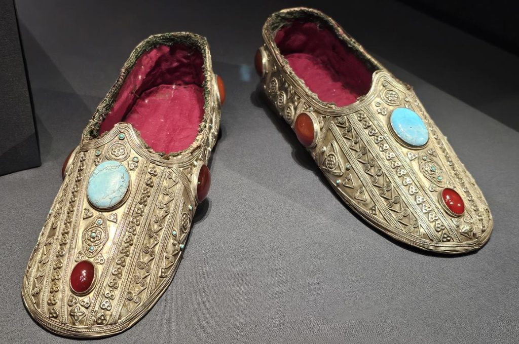 Slippers, Attributed to present-day Uzbekistan, possibly Karakalpak, Late19th to 20th century, Silver, turquoises, carnelians, red cotton fabric, Gift of Marshall and Marilyn R. Wolf, 2015, The Metropolitan Museum of Art, New 
York, Global Jewellery