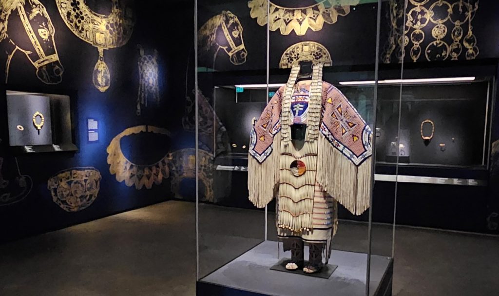 Woman’s dress and accessories 
Jodi Archambault (American, Teton 
Sioux, b. 1969) 
United States, North Dakota 
Hunkpapa Lakota (Teton Sioux), 2005 
Leather, glass and metal beads, cotton, silk, 
dentalium shell, metal cones, horsehair, 
plastic, brass bells, porcupine quills, coins 
Maria DeWitt Jesup Fund, 2019 
The Metropolitan Museum of Art, 
New York, Global Jewellery