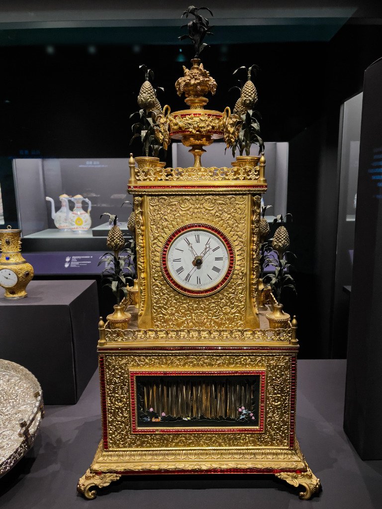 Gilt bronze clock with enamel and coloured glass inlay and waterfall features, Mark of “Cheong Smag Canton” in both Chinese and English characters, Second half of the 19th century, (Metal (gilt bronze) and glass, Proudly from Canton, Cantonese and Export Art, HKMoA