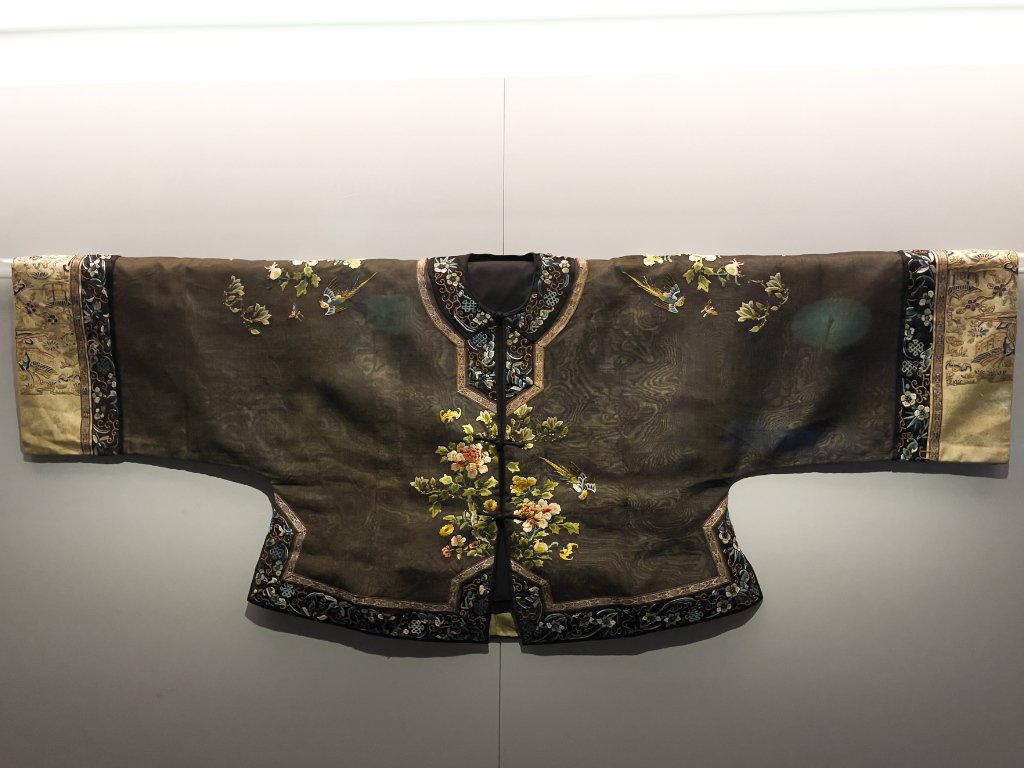 Upper grarmet embroidered with phoenix amidst peonies design on dark brown gauze, Qing dynasty (1644-1911), Textile, Proudly from Canton, Cantonese and Export Art, HKMoA